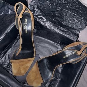 YSL heels with the logo as the heel.
